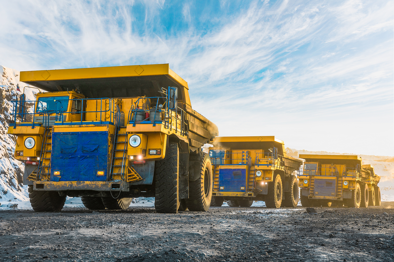 dumptrucks - Large-Quarry-Dump-Truck-Loading-Rocks-In-The-Dumper