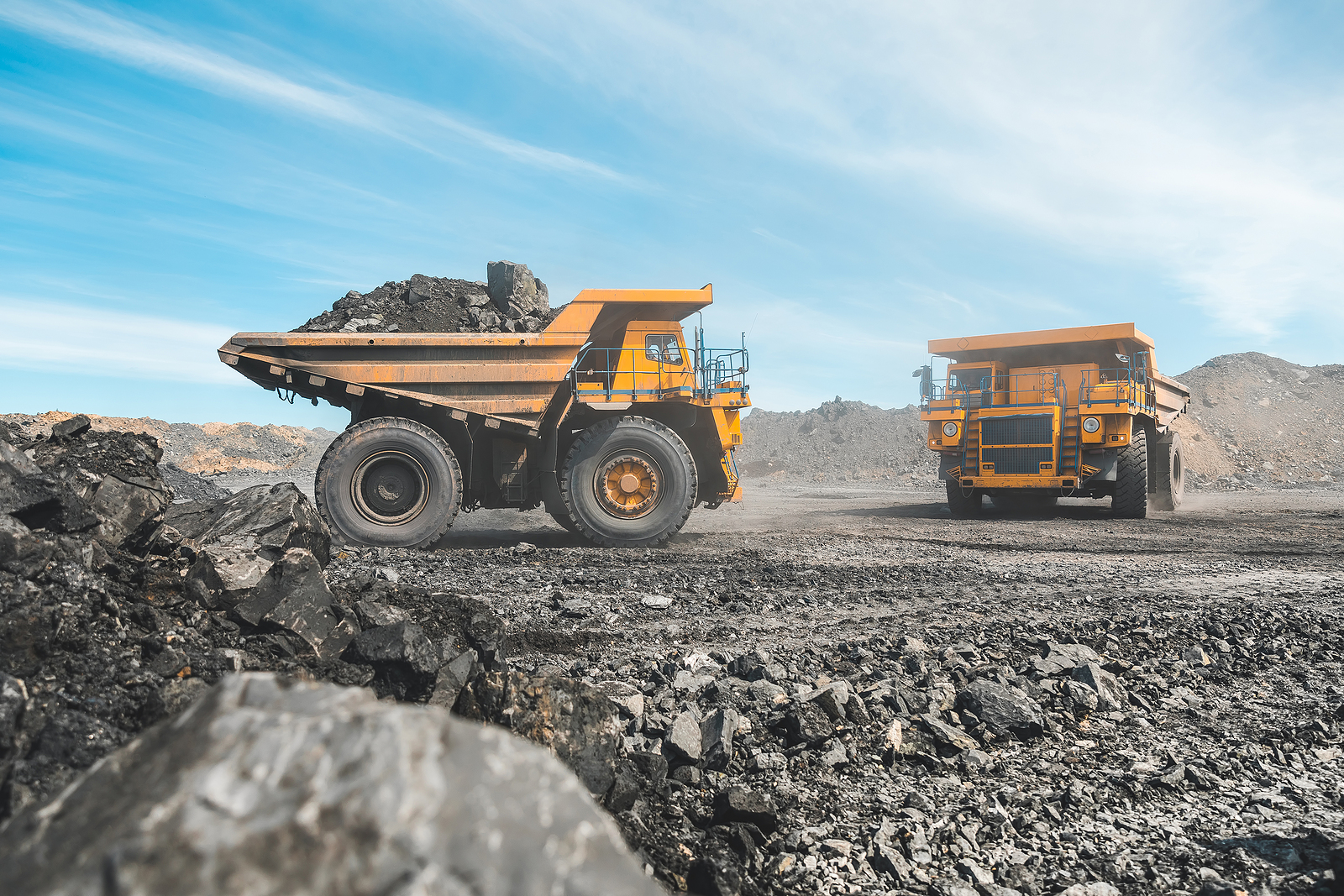 dumptrucks - Loading-Rocks-In-Dump-Truck